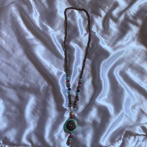 Vintage tong beaded elephant necklace